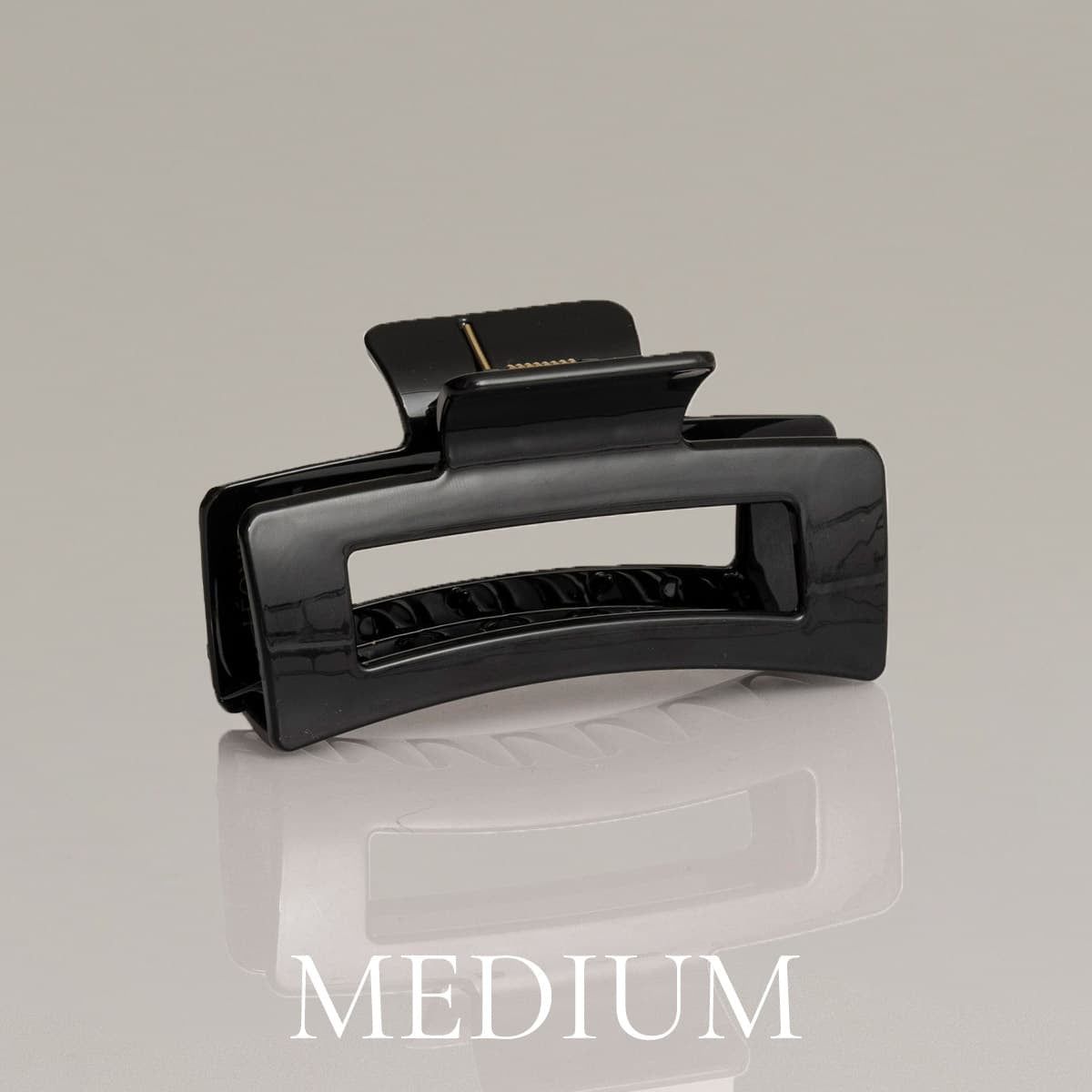 Léonie Hiusklipsi Kiiltävä Musta Medium